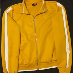 Yellow hoodless jacket with white stripe